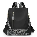 Sac à dos léopard femme noir en nylon et polyester – avec compartiments